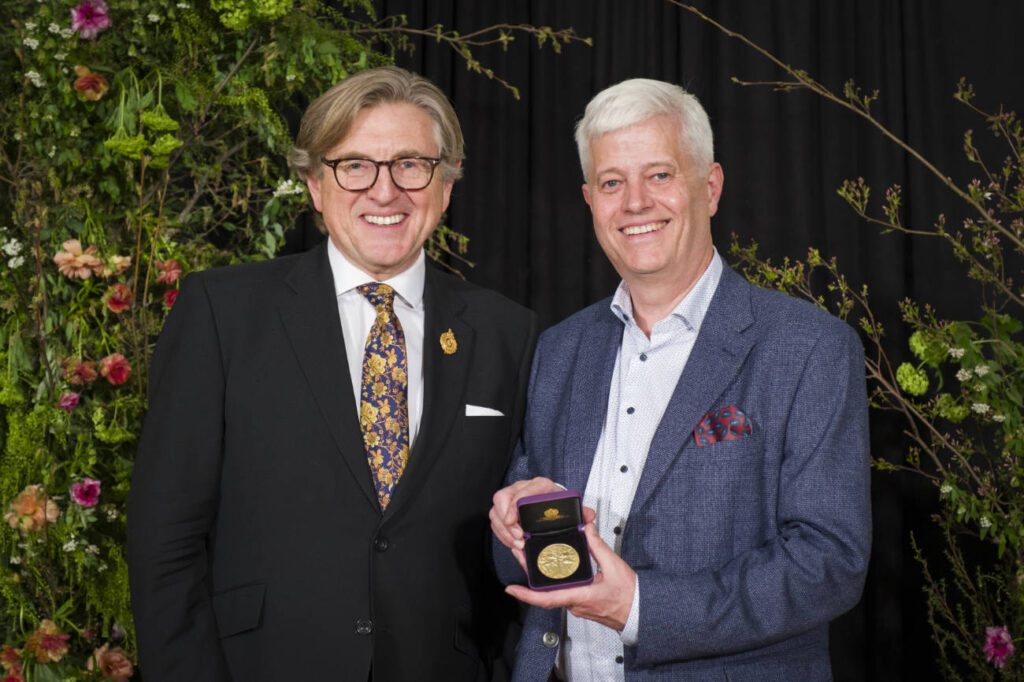 RHS Annual Awards Ceremony which was held at the RHS Lindley Hall on the 26th March 2024...Pictured (left to right) is Keith Weed (President of the RHS) with Mr Billy Alexander of Kells Bay House & Gardens recipient of the Lawence Medal..Photography by.Ric